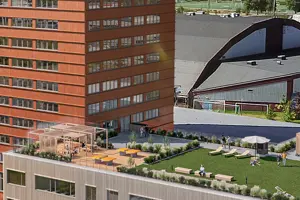 Nivika center, orange samt grå fasad, gräs på takterrassen | Nivika Fastigheter AB (publ)