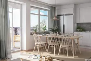 Kök med vita luckor, matsalsbord samt stolar i trä, stora fönster | Nivika Fastigheter AB (publ)