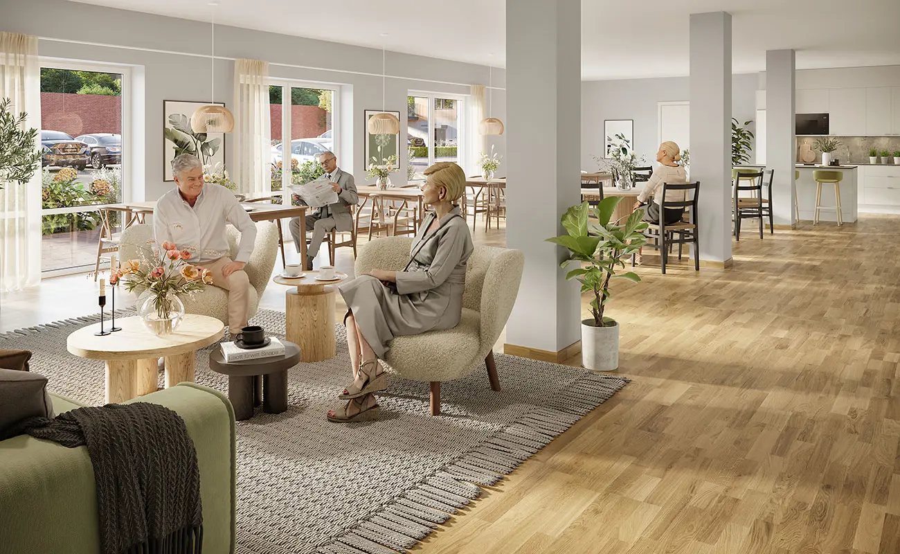 Stort rum med trägolv, vita väggar, fåtöljer och stolar | Nivika Fastigheter AB (publ)