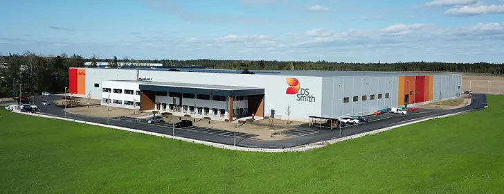 Industrifastighet med vit och orange plåtfasad | Nivika Fastigheter AB (publ)