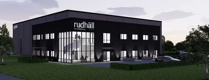 Industrifastighet med mörkgrå och svart fasad, illustration | Nivika Fastigheter AB (publ)