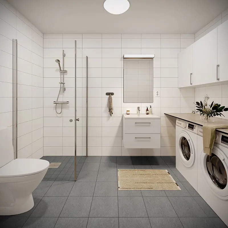 Badrum med toalett, handfat, dusch, tvättmaskin och torktumlare | Nivika Fastigheter AB (publ)