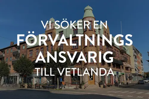 Fastighet med röd tegelfasad och grönt koppartak | Nivika Fastigheter AB (publ)